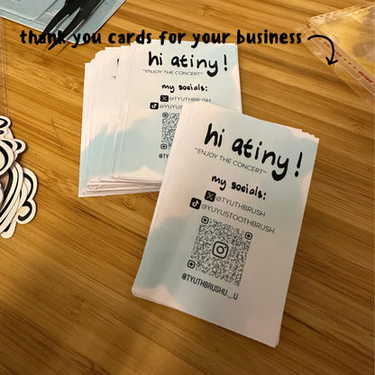 Business cards with text and QR code