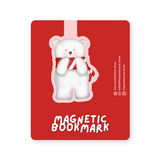Magnetic bookmark with a bear design on a backing card