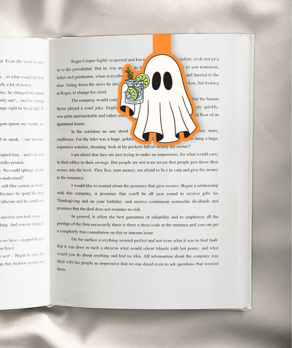 A lime green magnetic bookmark featuring a cartoon ghost holding a beer mug, with the text 'MAGNETIC BOOKMARK' in bold black letters at the bottom and social media/store details on the right.